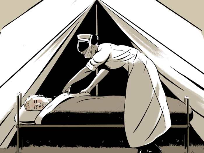 A nurse tucks a patient into a bed.